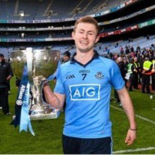 Jack McCaffrey holding Sam Maguire Cup