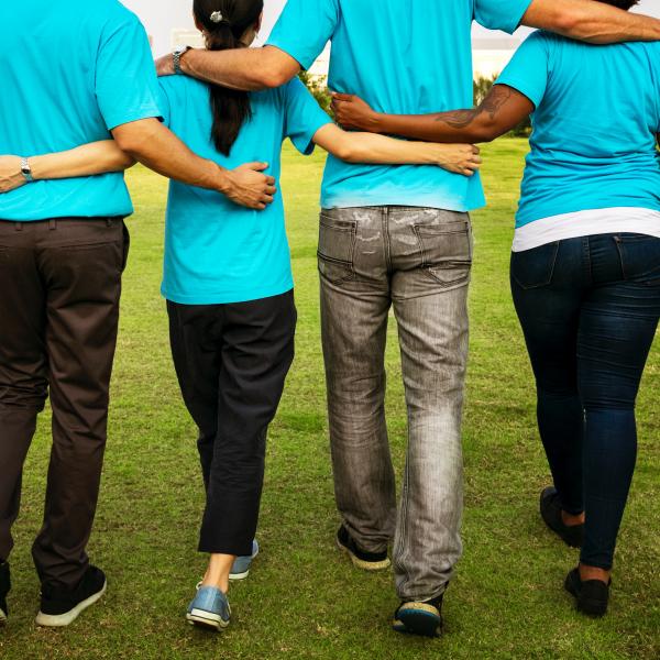 Volunteers Walking arm in arm