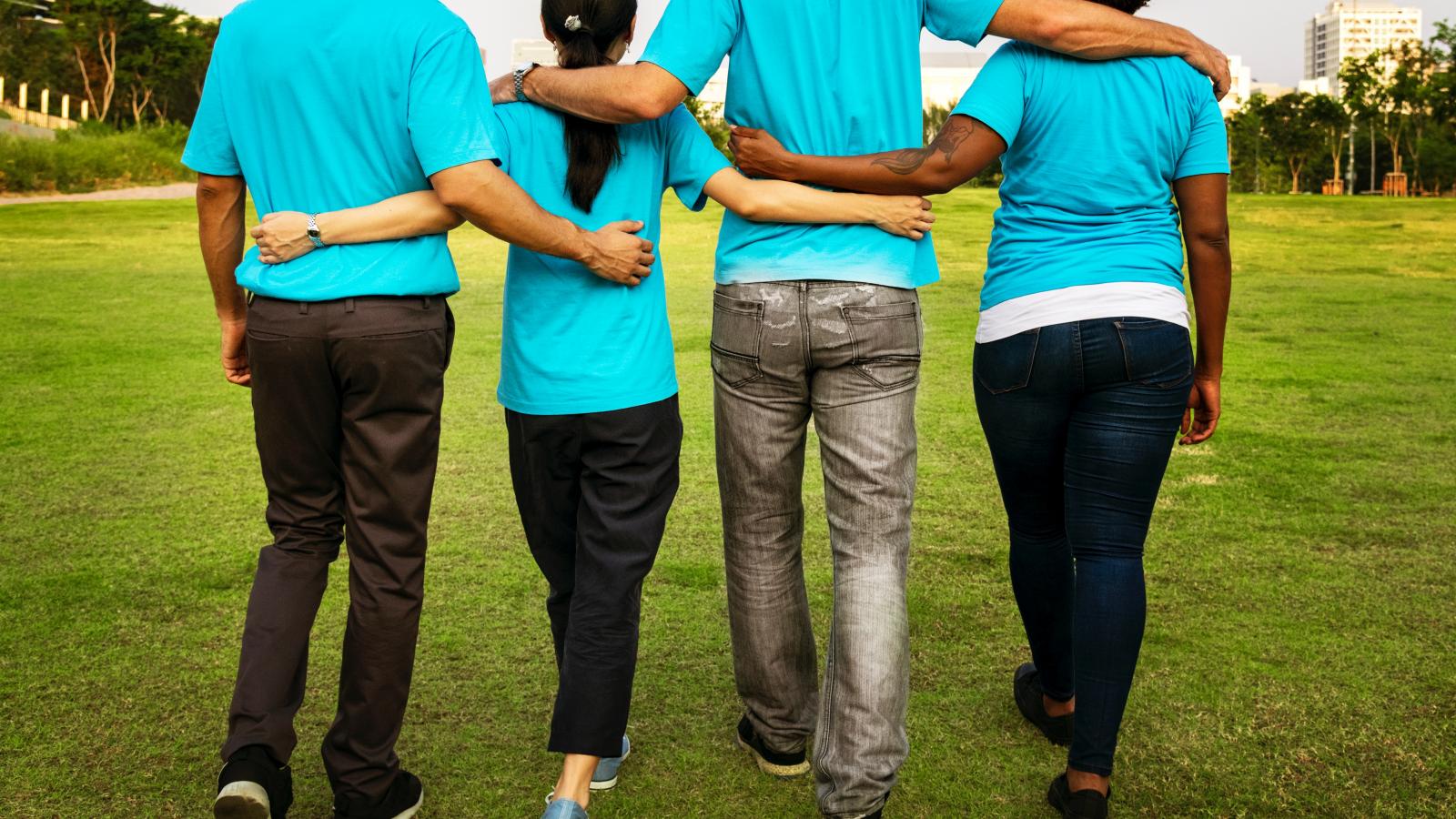 Volunteers Walking arm in arm