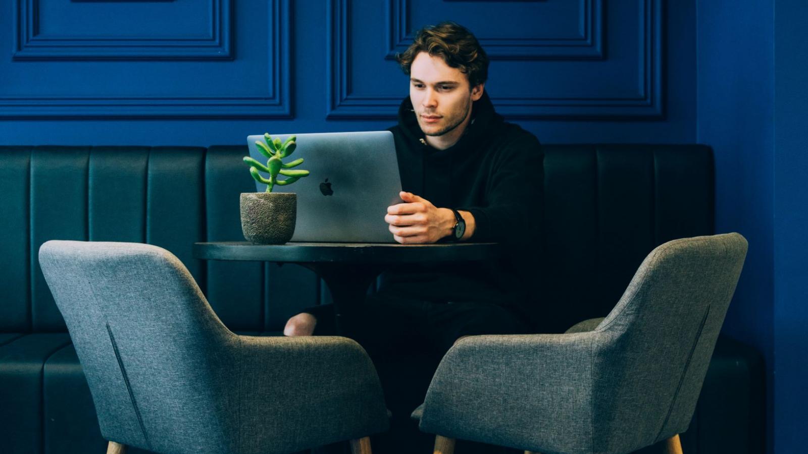 Man working alone at a table