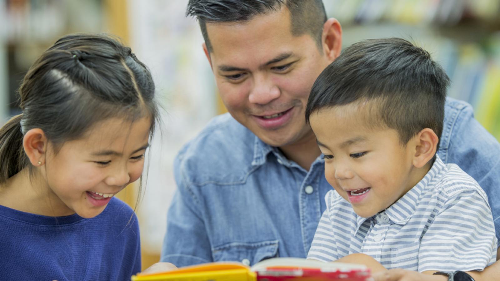 Parent reading with children